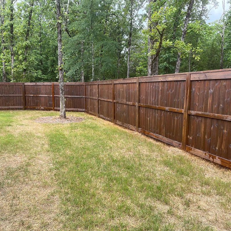 dark stained privacy wood fence