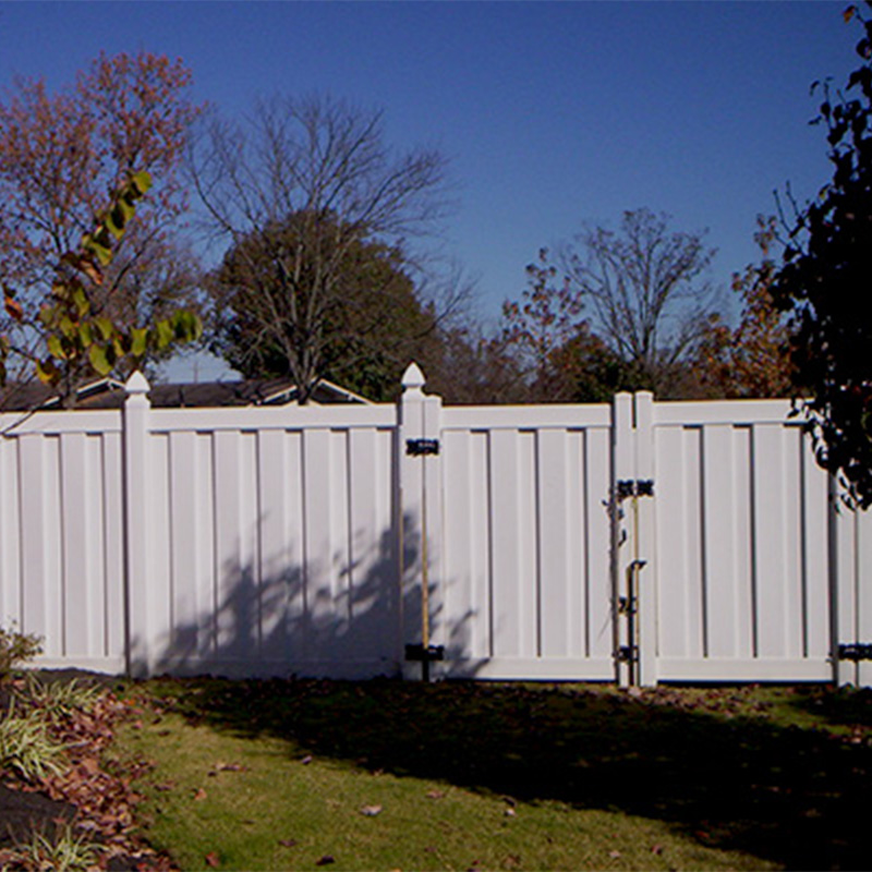 vinyl perimeter fence with gate and black accent hardware